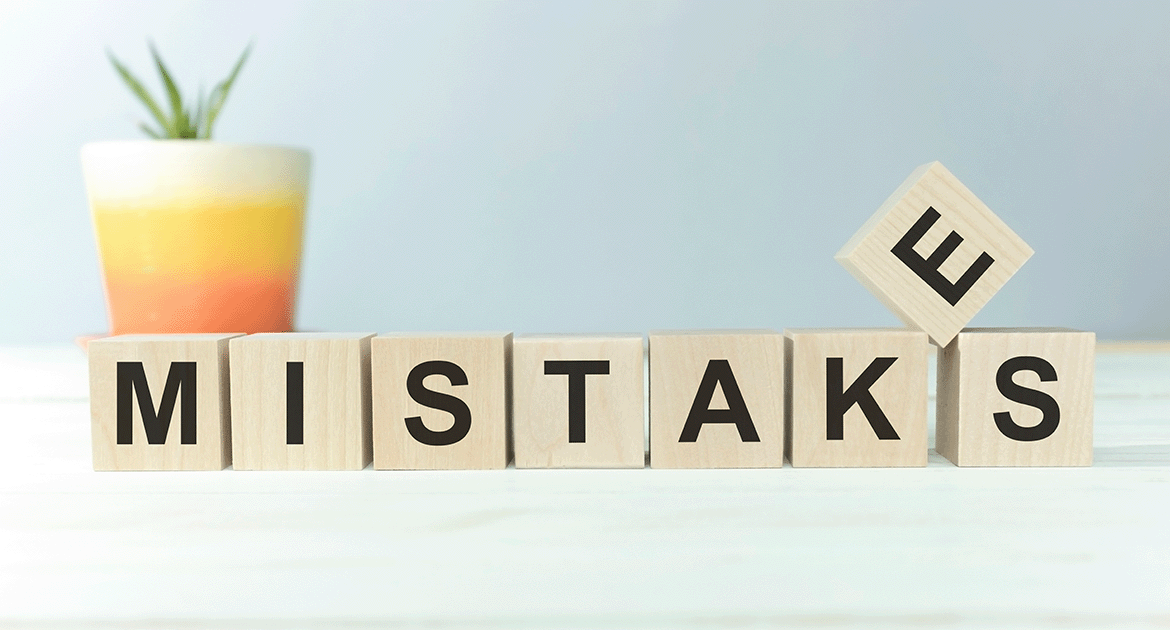 MISTAKES-word-written-on-wood-block-on-a-light-background