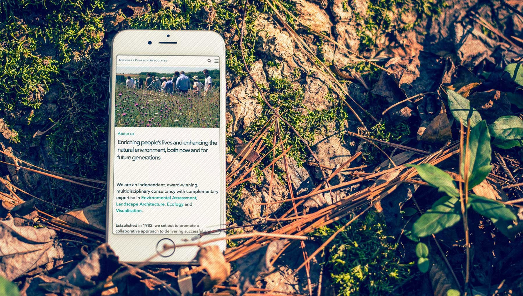 Nicholas Pearson Associates website viewed on iPhone, designed and developed by Marcom